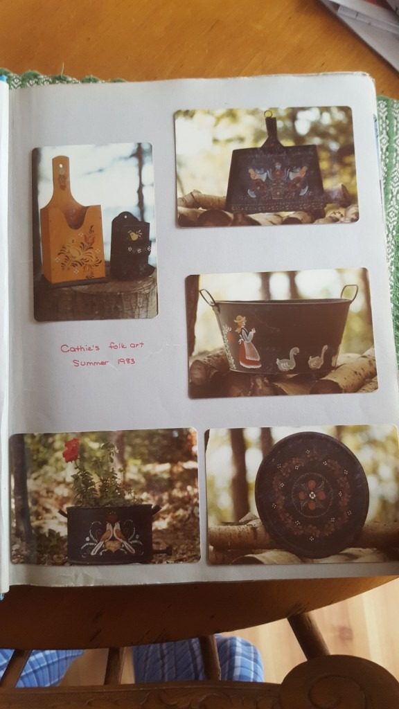 Scrapbook page titled Cathie's folk art, summer 1983